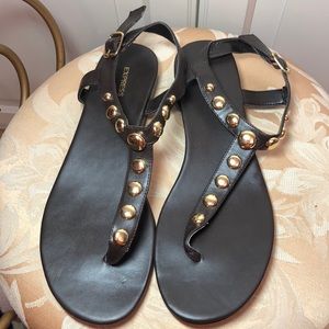 Brown sandals with gold details